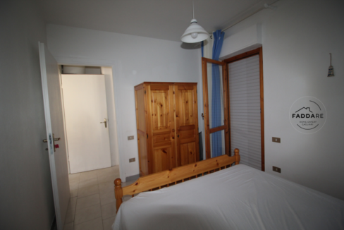 13.Camera-da-letto-con-armadio-appartamento-Buggerru-Sardegna