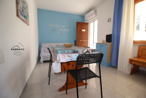 8.Soggiorno-con-angolo-relax-appartamento-Buggerru-Sardegna